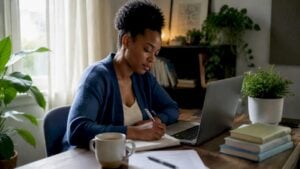 Woman preparing notes for mental health appointment