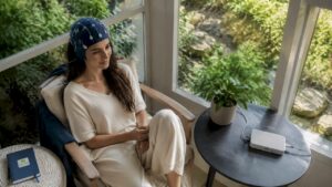 Woman receiving neurofeedback therapy for anxiety