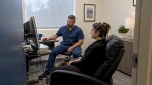 Patient receiving neurofeedback in a clinic
